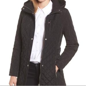 Calvin Klein black diamond quilted hooded jacket with zip/snap placket.